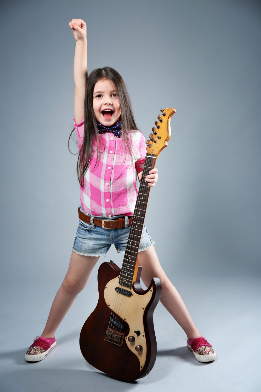 Beautiful Artistic Little Girl Playing Guitar On Grey Background   1 Gitarzystka 1080x1620 